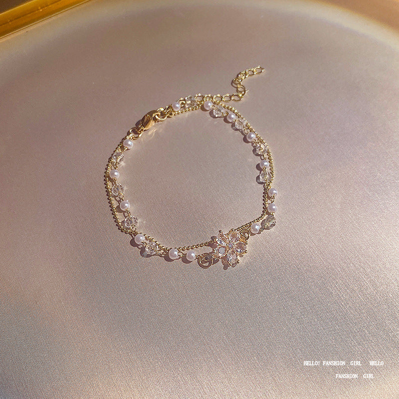 Wholesale Double Layer Pearl Zircon Flower Titanium Steel Bracelet